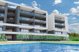 New modern apartment with communal pool in residential area of Portimao